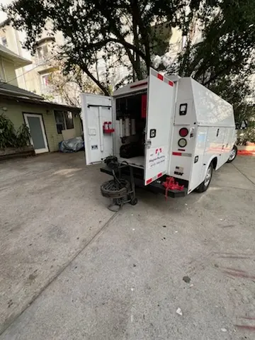 Magnet Plumbing service vehicle on-site for Grease Trap Cleaning in Palm Aire